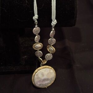 Elegant Gold and Silver Pendant Necklace